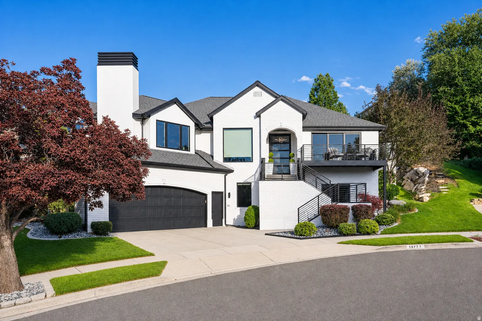 White brick exterior with black trim accents