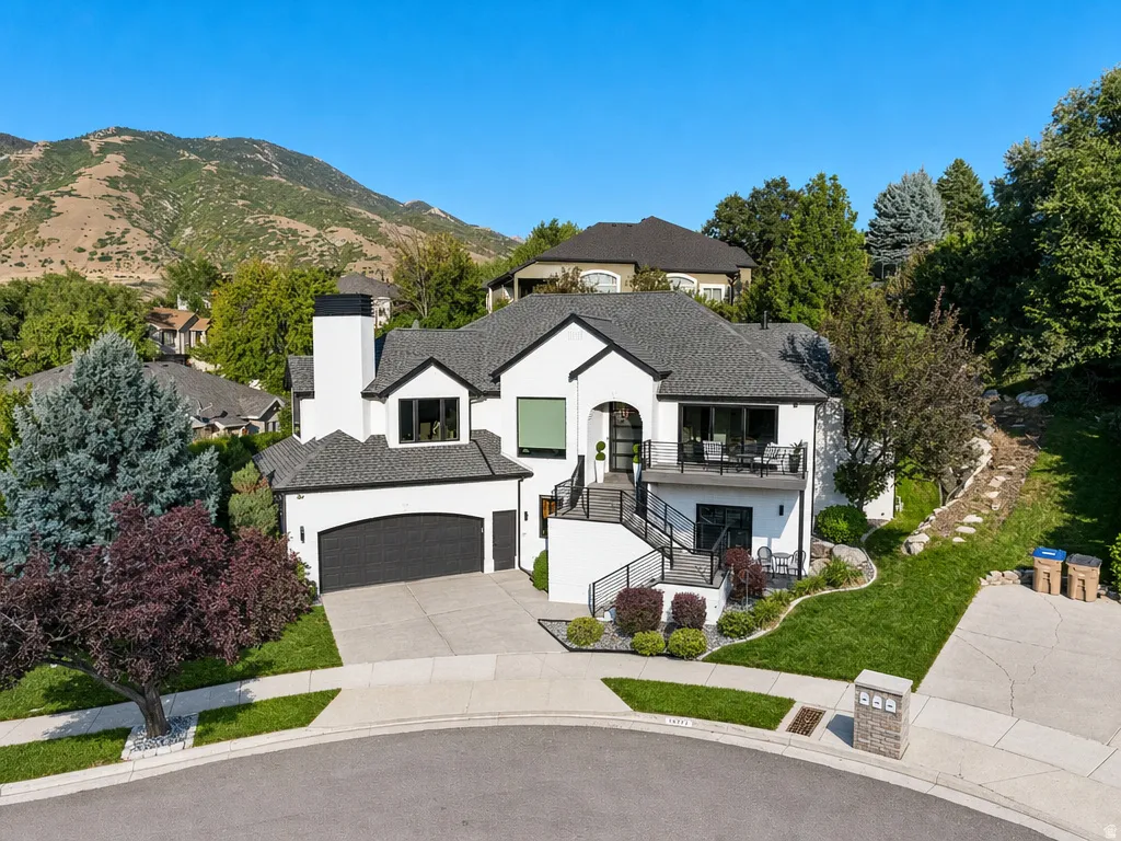 Contemporary architecture with white stucco and dark trim