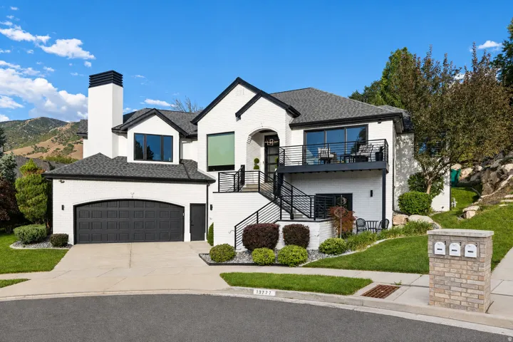 White brick exterior with black trim accents