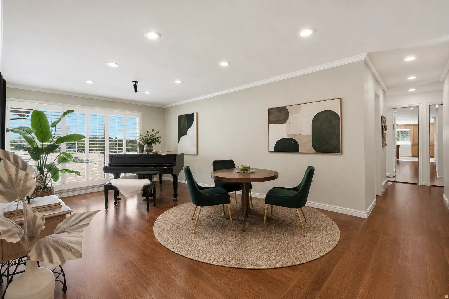 Hardwood flooring throughout, recessed lighting, crown molding, and white plantation shutters