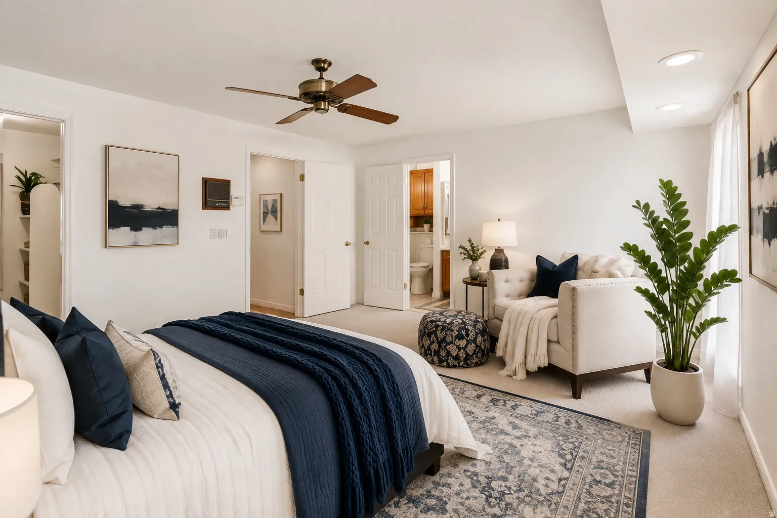 Recessed lighting, ceiling fan, and carpeted flooring