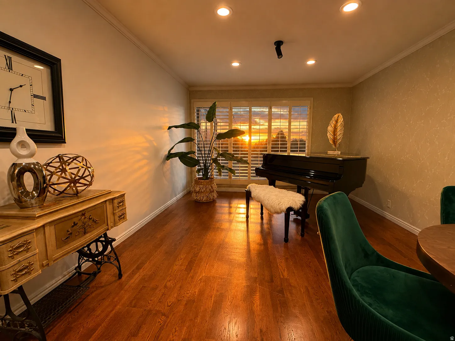 Hardwood flooring, recessed lighting, crown molding, and window shutters