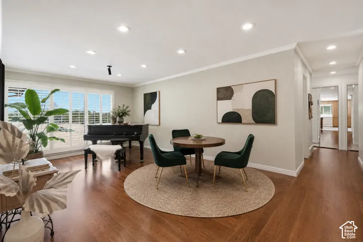 Hardwood flooring throughout, recessed lighting, crown molding, and white plantation shutters