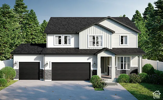 Contemporary two-story exterior with a two-car garage, dark shingle roofing, and light-colored siding