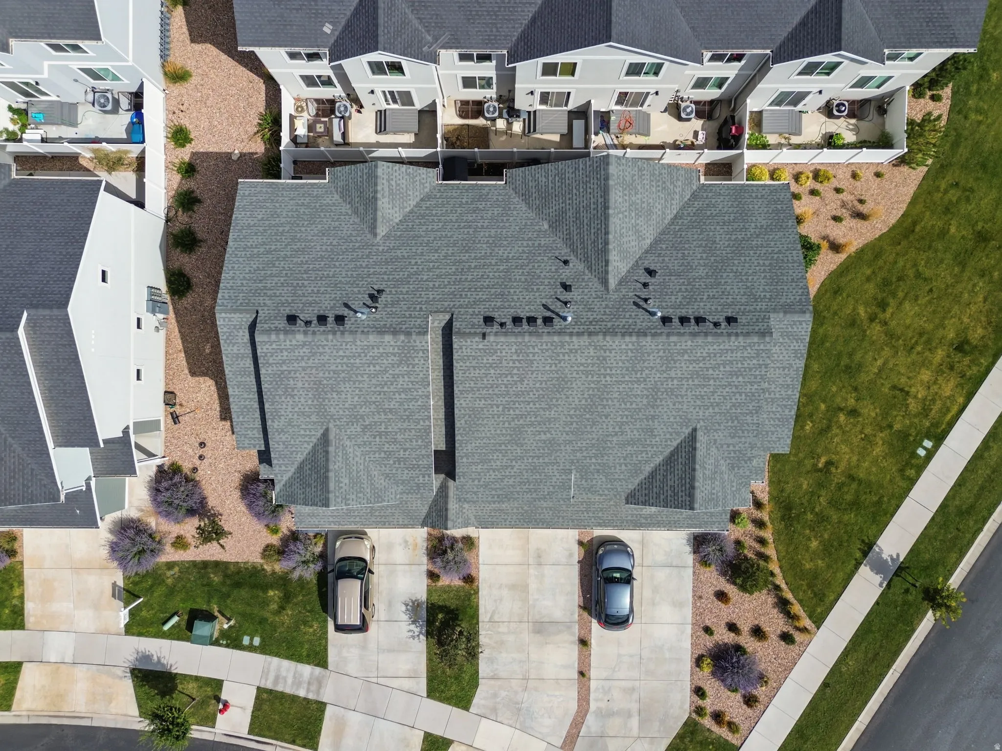 Attached residential structures with private driveways