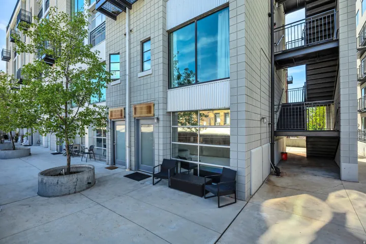 Modern building exterior with block siding and large pane windows