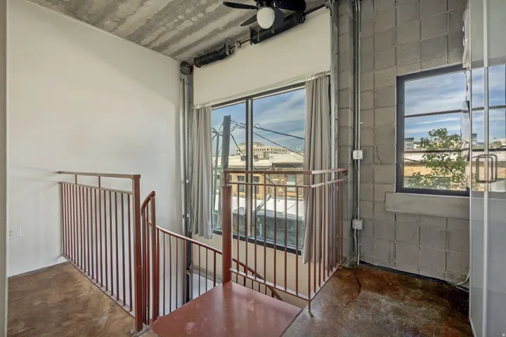 Industrial-style concrete ceiling and concrete block wall