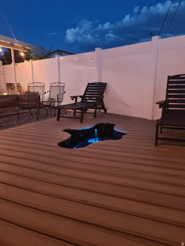 Brown composite decking with an integrated water feature