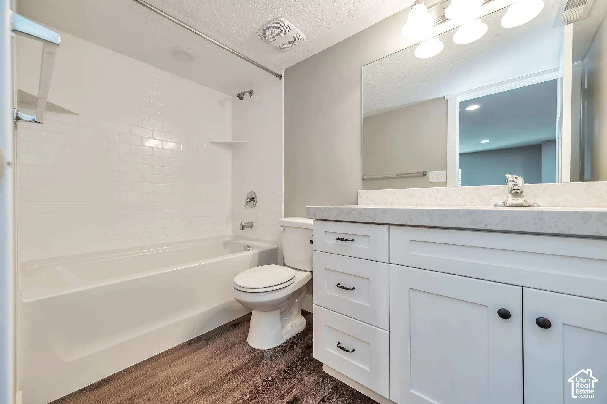 White subway tile shower surround