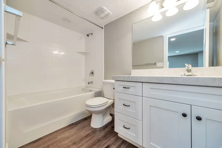 White subway tile shower surround