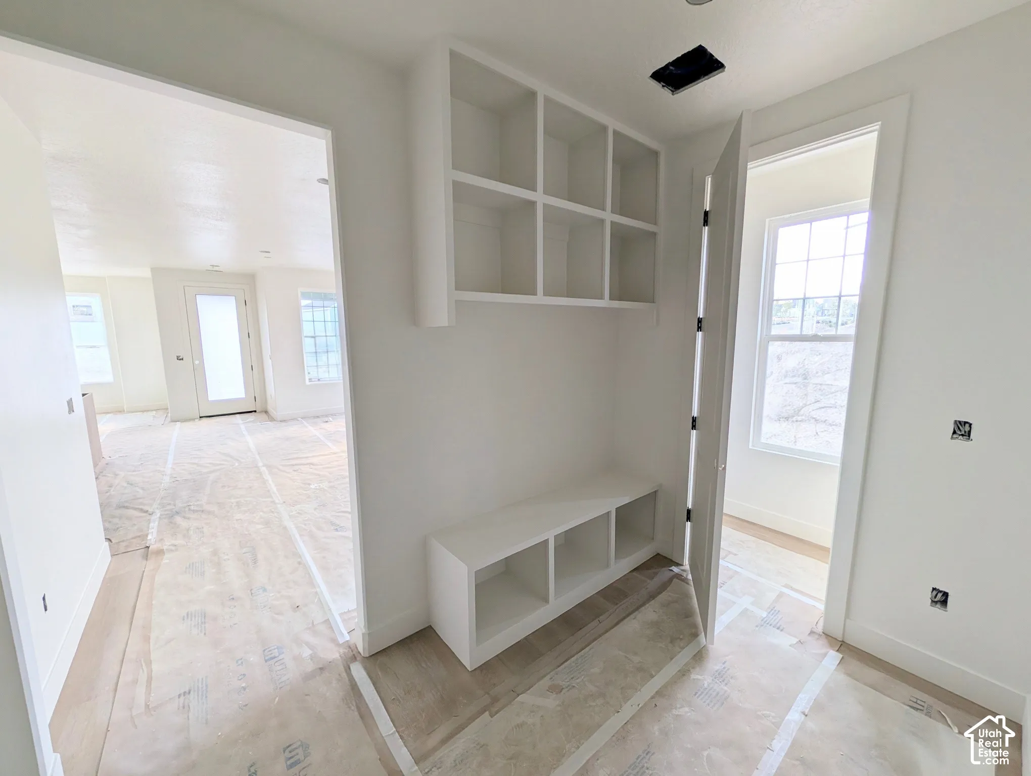 Built-in shelving unit with lower storage cubbies