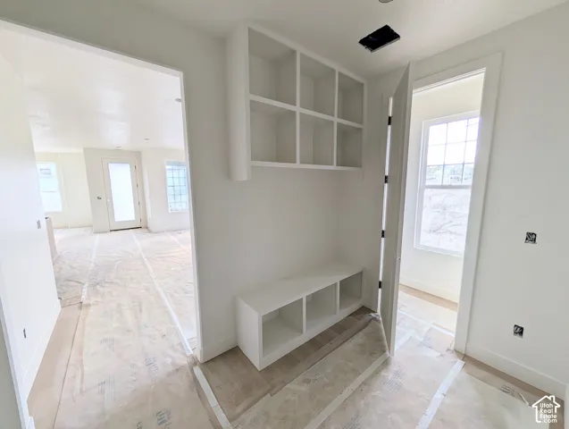 Built-in shelving unit with lower storage cubbies