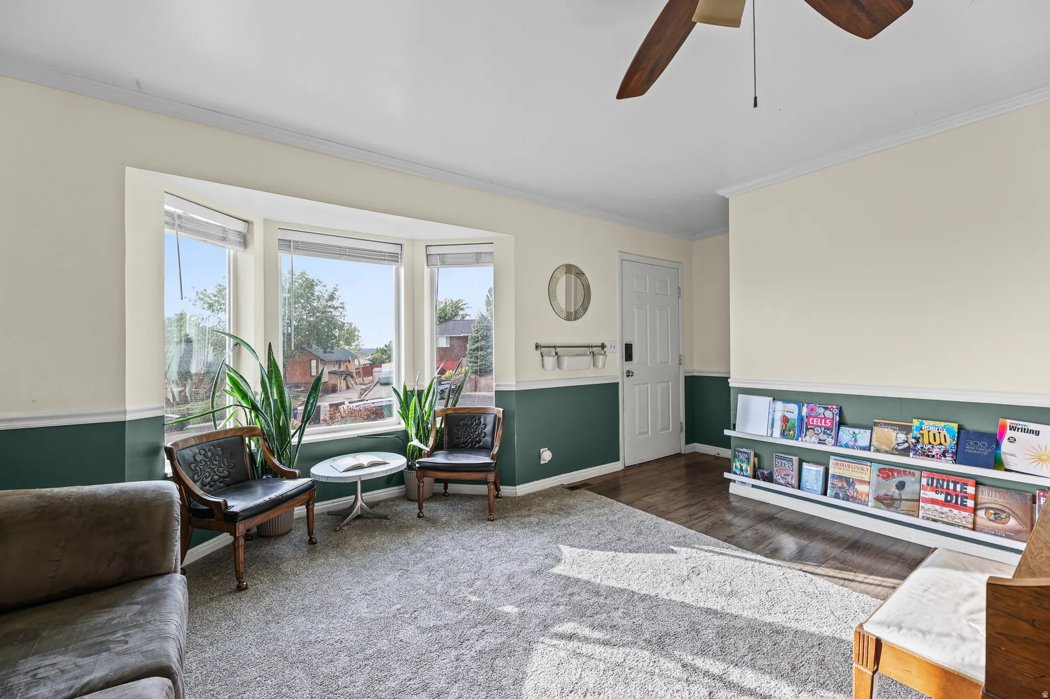 Living room with brand new carpet and bay window