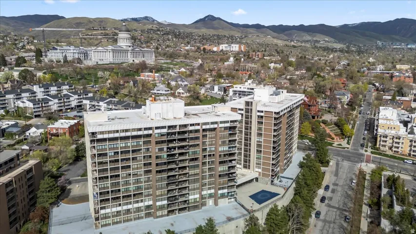 Two multi-story buildings with balconies