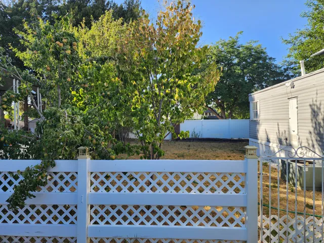 White lattice fence and gate