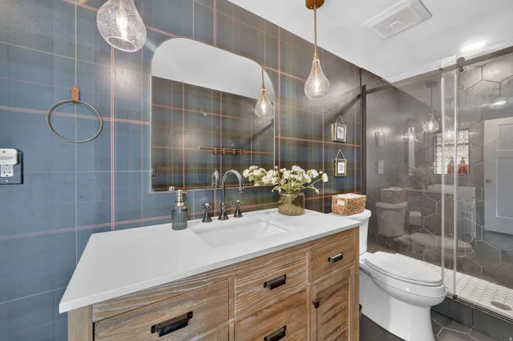 Vanity with an integrated sink and white countertop