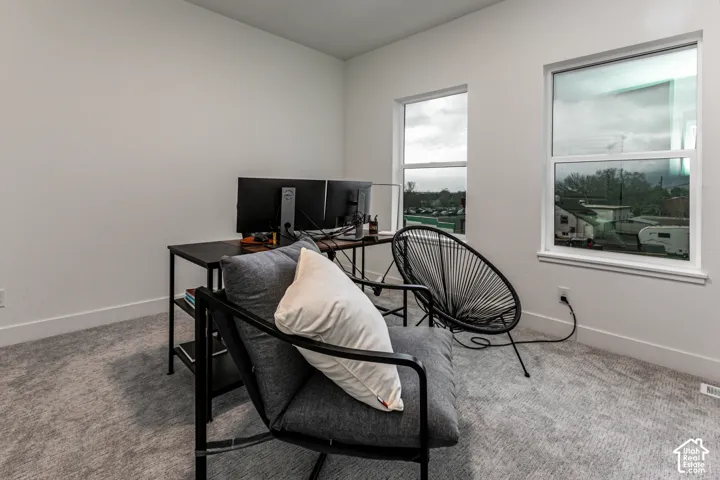 Neutral tone wall color, two windows, and gray carpeted flooringhttps://www.utahrealestate.com/lip.wizard/run/step/2/hbid/5521041#