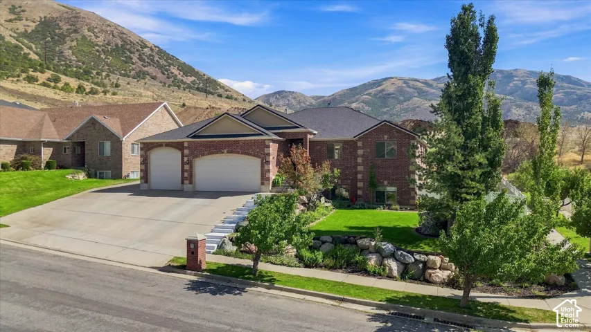 Brick exterior with a two-car garage