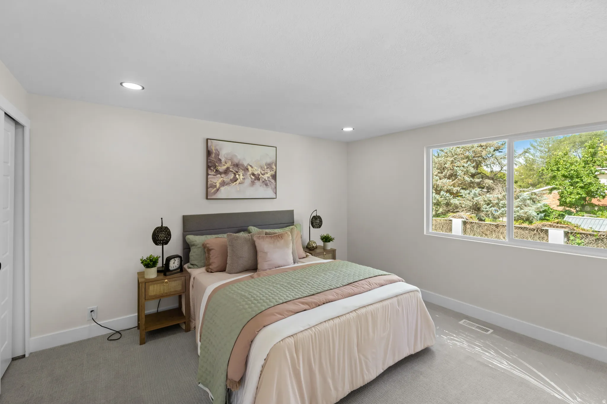 Light-colored walls with recessed lighting