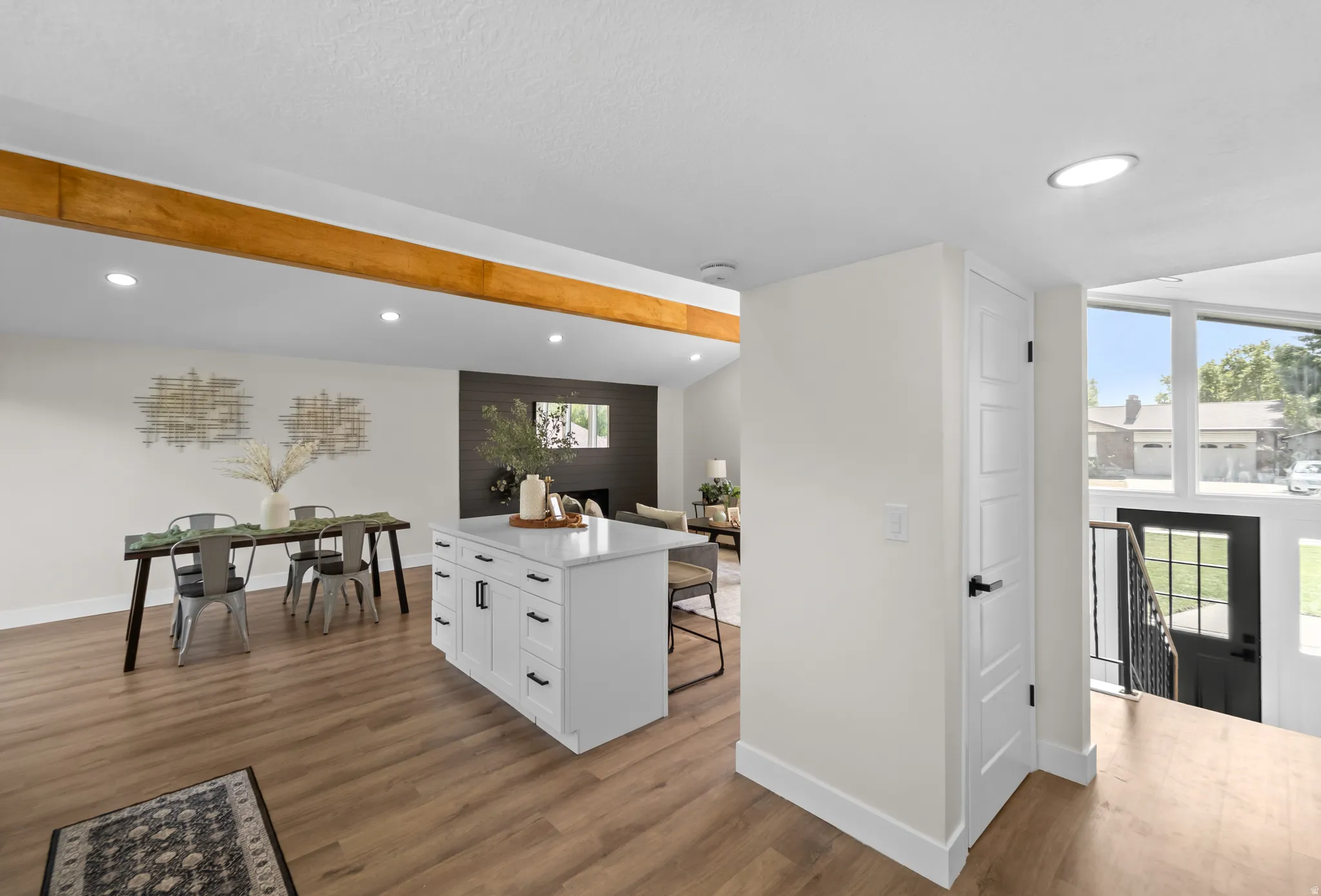 White kitchen island with a light-toned countertop