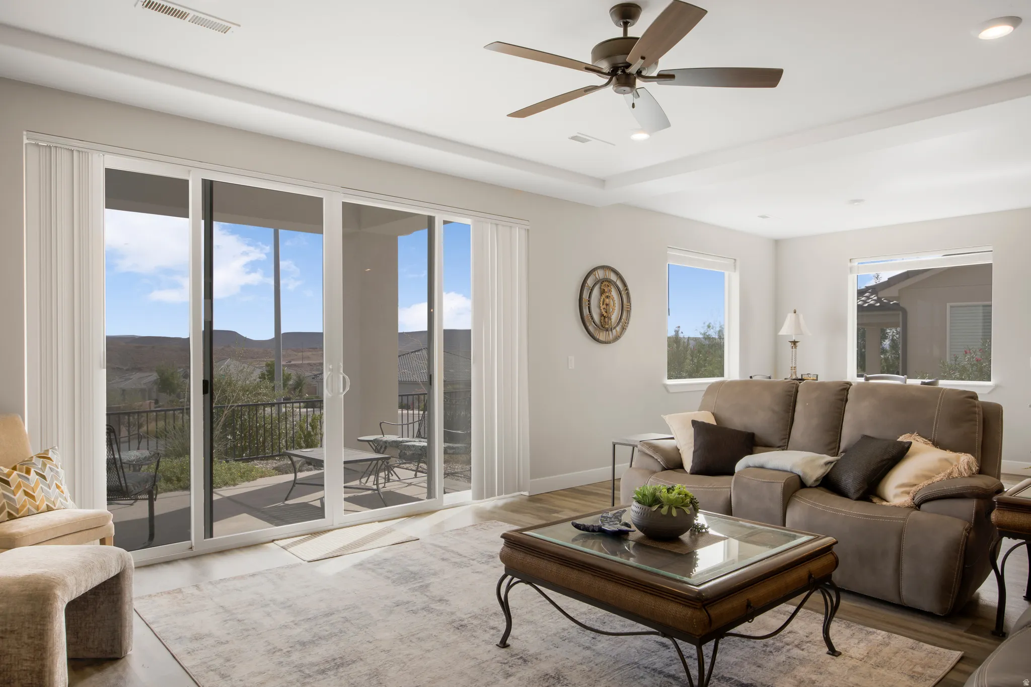 Hard-surface flooring, recessed lighting, and a ceiling fan