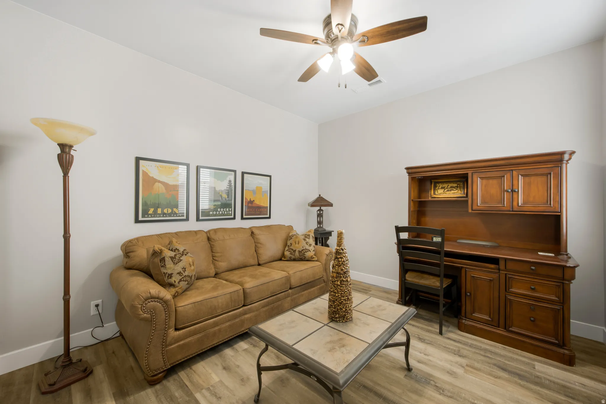 Recessed lighting and a ceiling fan with light kit