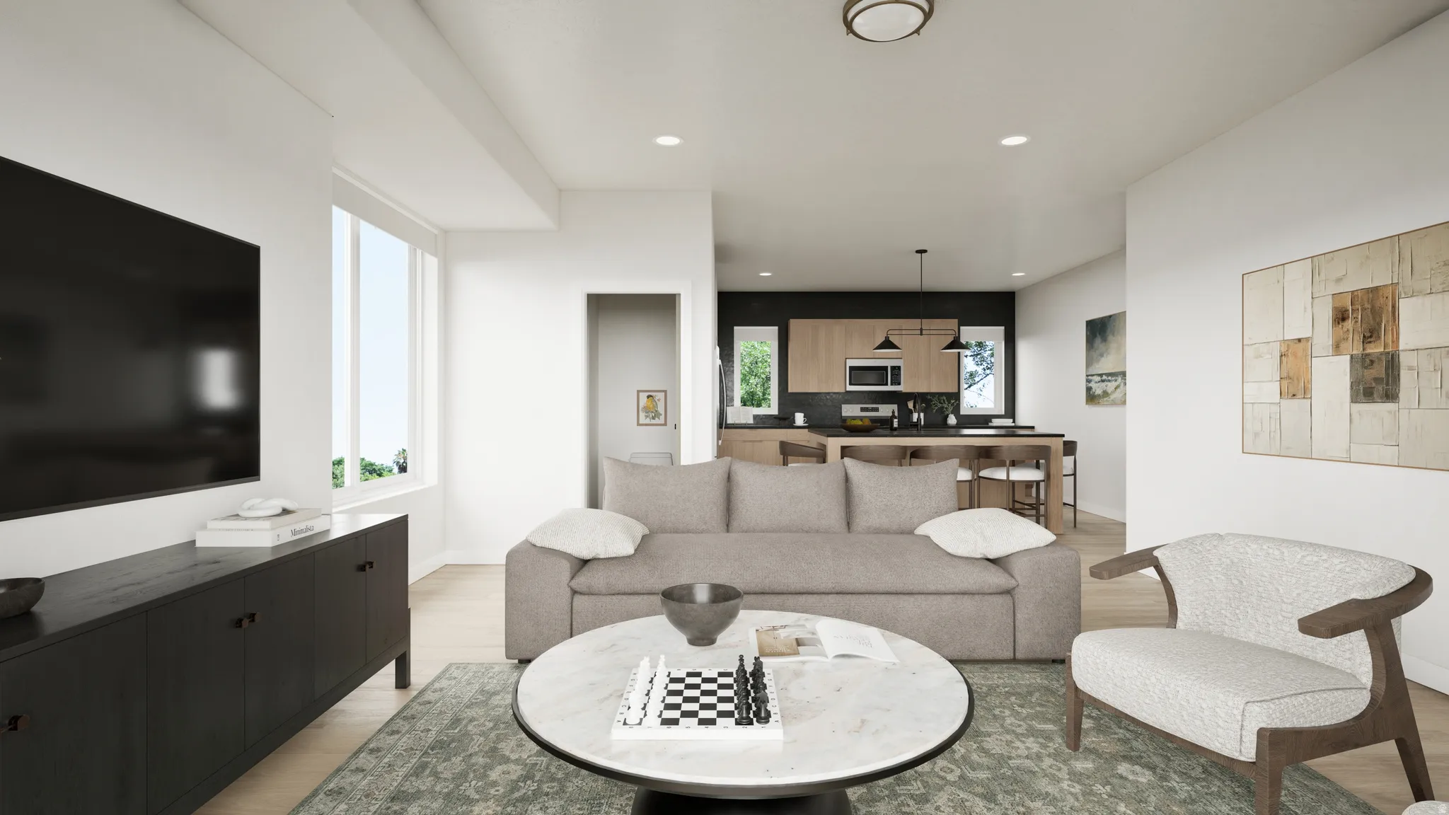 Expansive living area featuring light wood-finish flooring, recessed lighting, and a large window