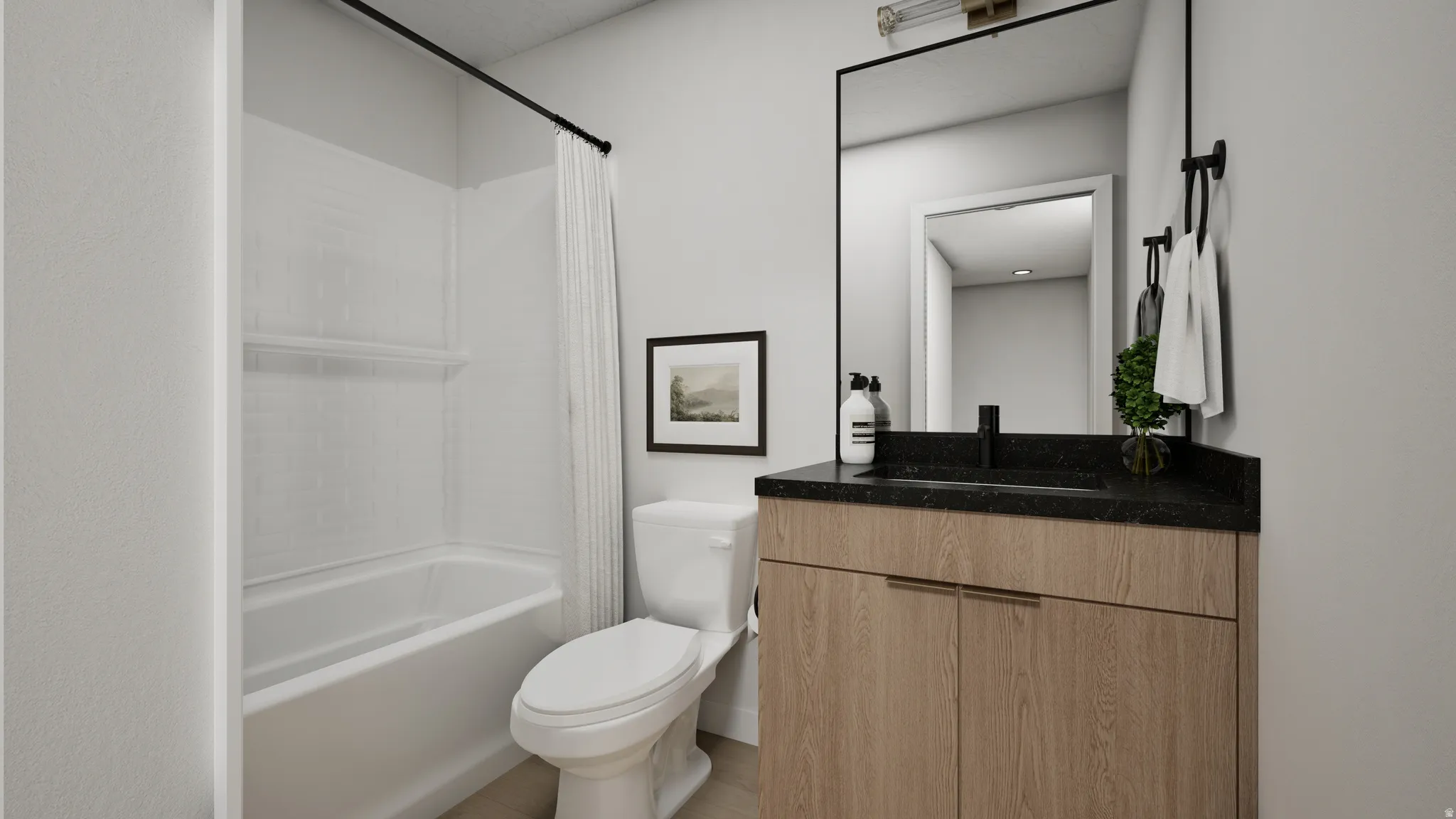 Wood-finish vanity with black countertop, rectangular undermount sink, and wall-mounted mirror