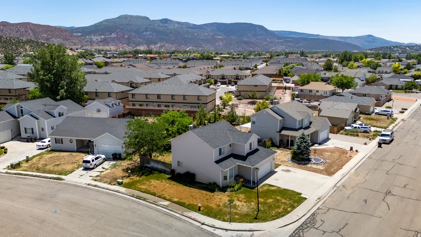 Residential neighborhood setting with distant mountains