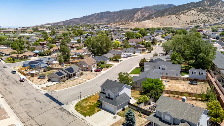 Residential neighborhood setting with mountains in the background