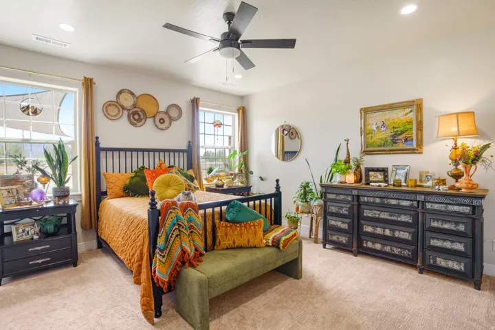 Recessed lighting, ceiling fan, and carpeted flooring