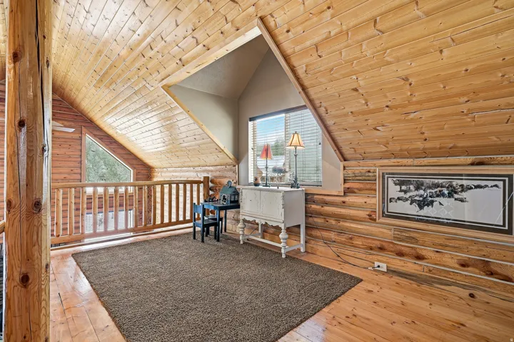 Wood-paneled walls and ceiling