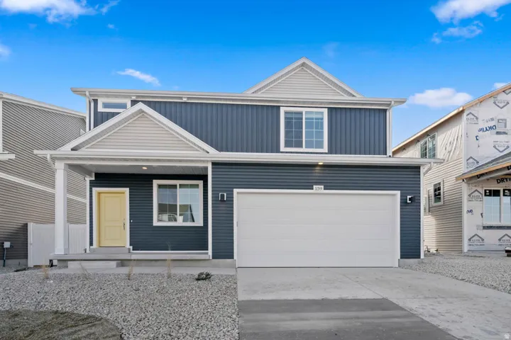 Blue horizontal siding with white trim