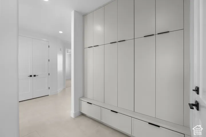 Integrated storage cabinetry with matte black hardware