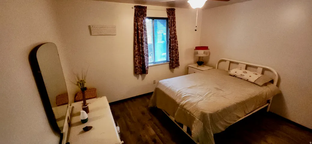 Basement room #1 - Wood LVP Flooring. Ceiling Fan. Do not have a closet