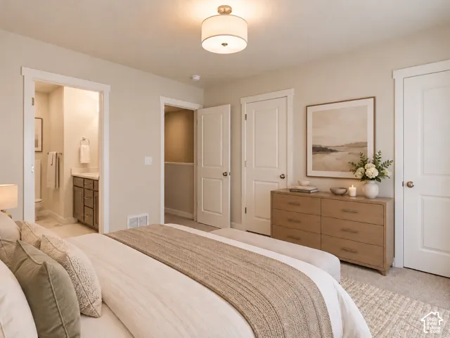Neutral-toned interior featuring two-panel interior doors, a semi-flush mount drum light fixture, and carpeted flooring