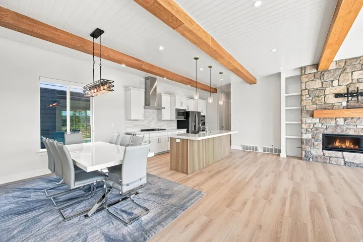 Exposed wood beams and shiplap ceiling