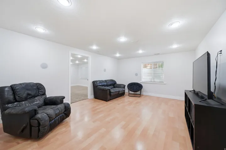 Large family room with recessed lights