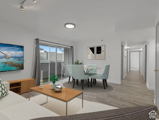 Hard surface flooring, sliding glass door, recessed lighting, track lighting, and a private patio