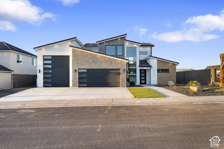 Modern architectural design with stone and wood-finish siding accents