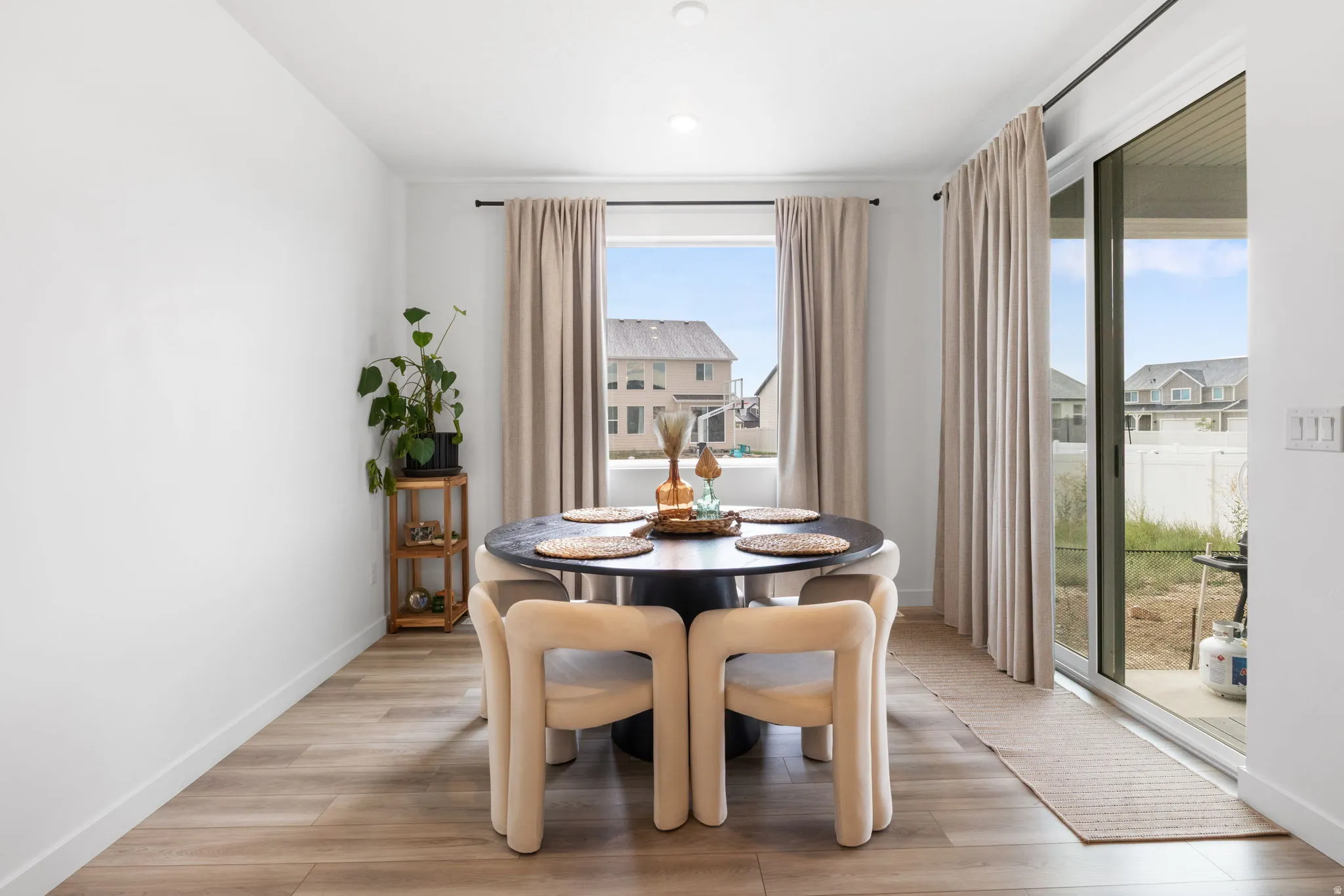 Separate dining area with natural lighting from the large window