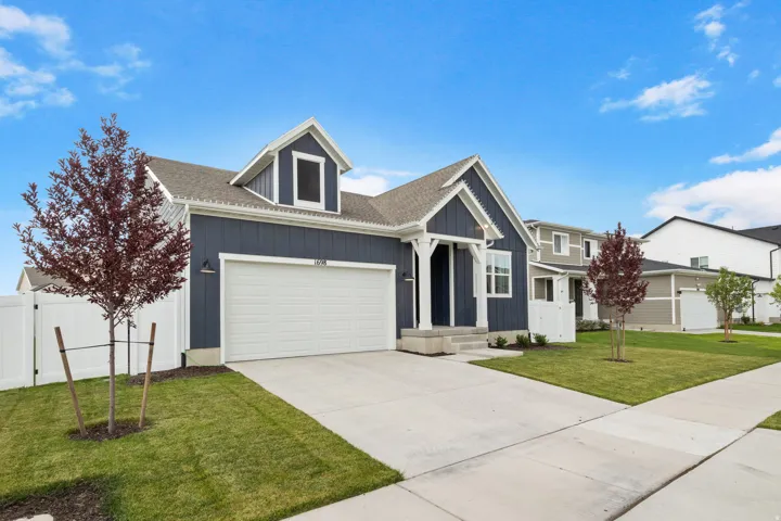 Like new home featuring long driveway blue siding and white trim