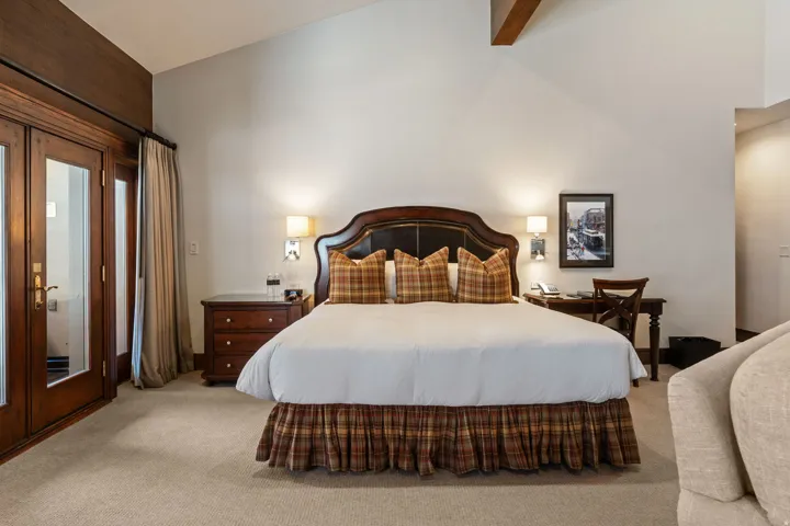 Vaulted ceiling with exposed wood beam