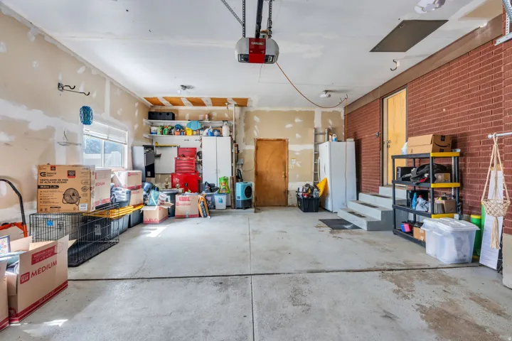 Concrete flooring with overhead garage door opener