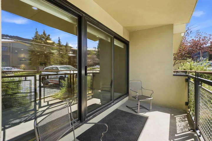 Exterior patio with gate to access slopes, great for enjoying coffee or glass of wine