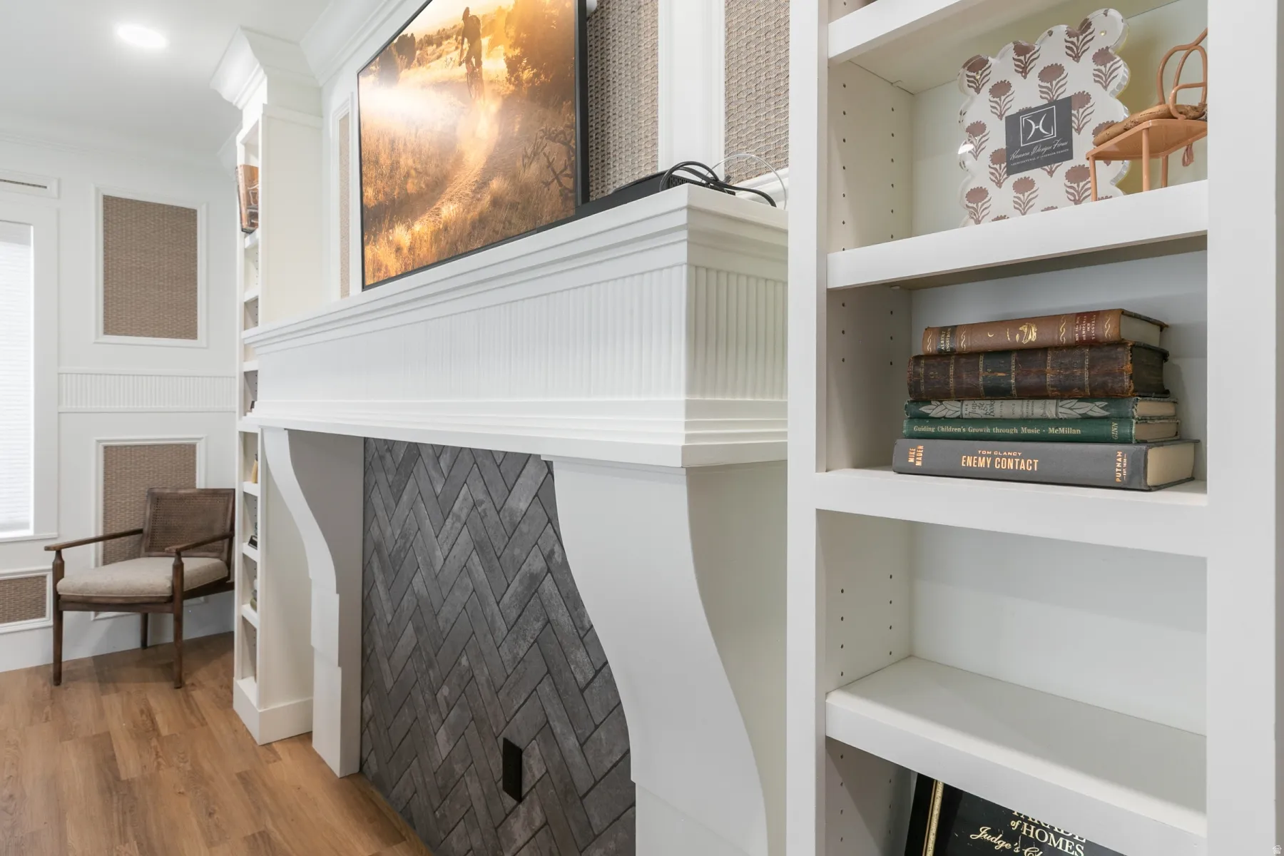 White mantel with a herringbone pattern firebox