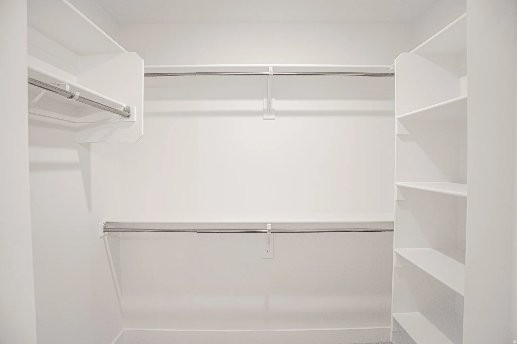 Spacious walk-in closet as part of primary suite.