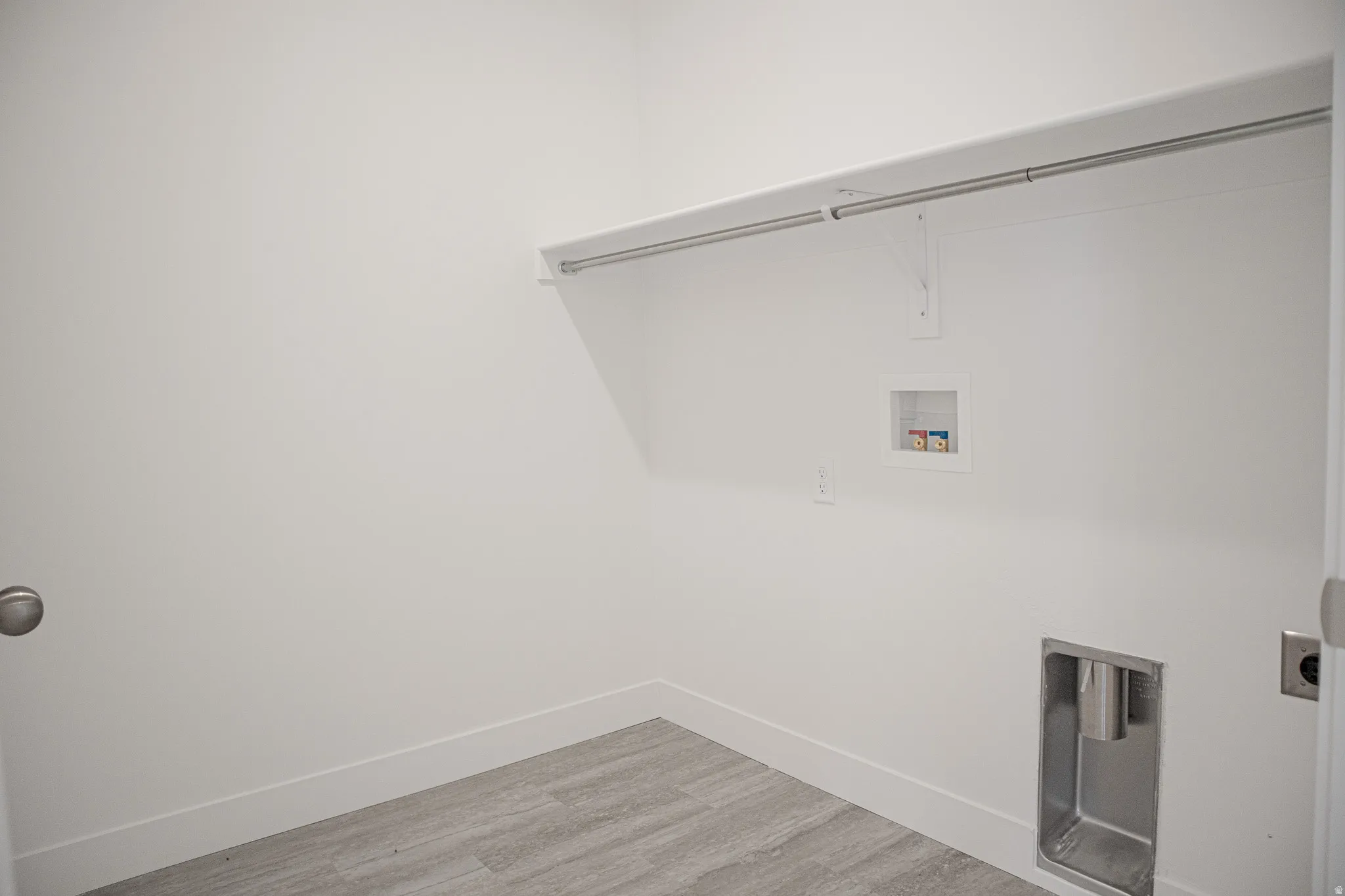 Full-size, dedicated laundry room.