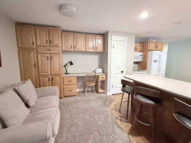 Built-in desk area with wood-finish cabinetry