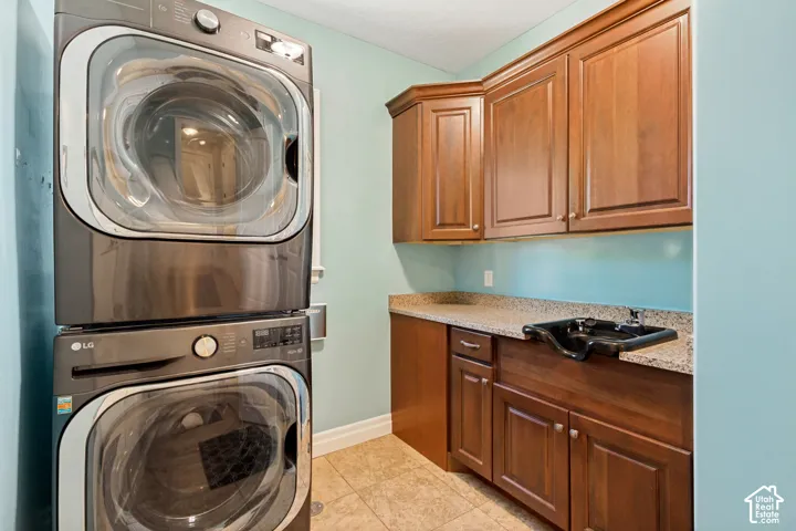 Wood-finish cabinetry with a built-in sink and countertop